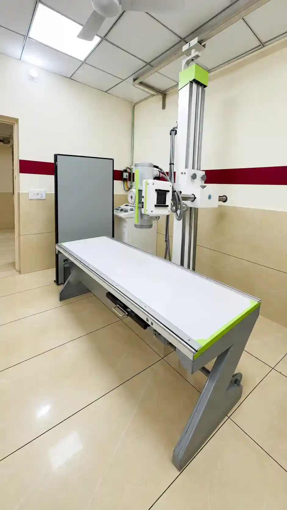 Representative X-Ray equipment in an examination room.