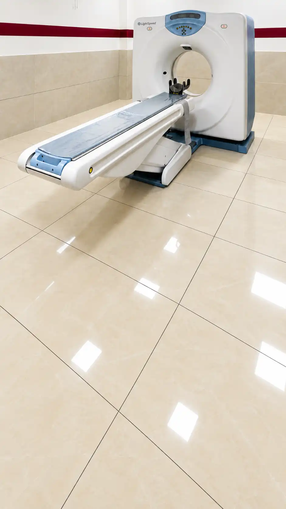 Representative CT scanner in an examination room.