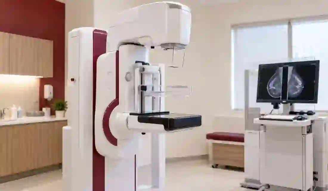 Digital mammography equipment in an imaging room.